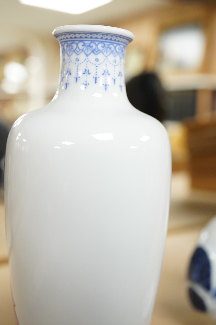 A Chinese famille rose figural vase, 17cm high